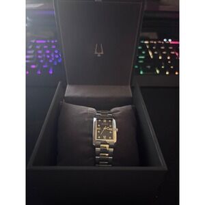 Bulova womens Two Tone Diamond Accent Rectangular Black Dial Watch 98P230